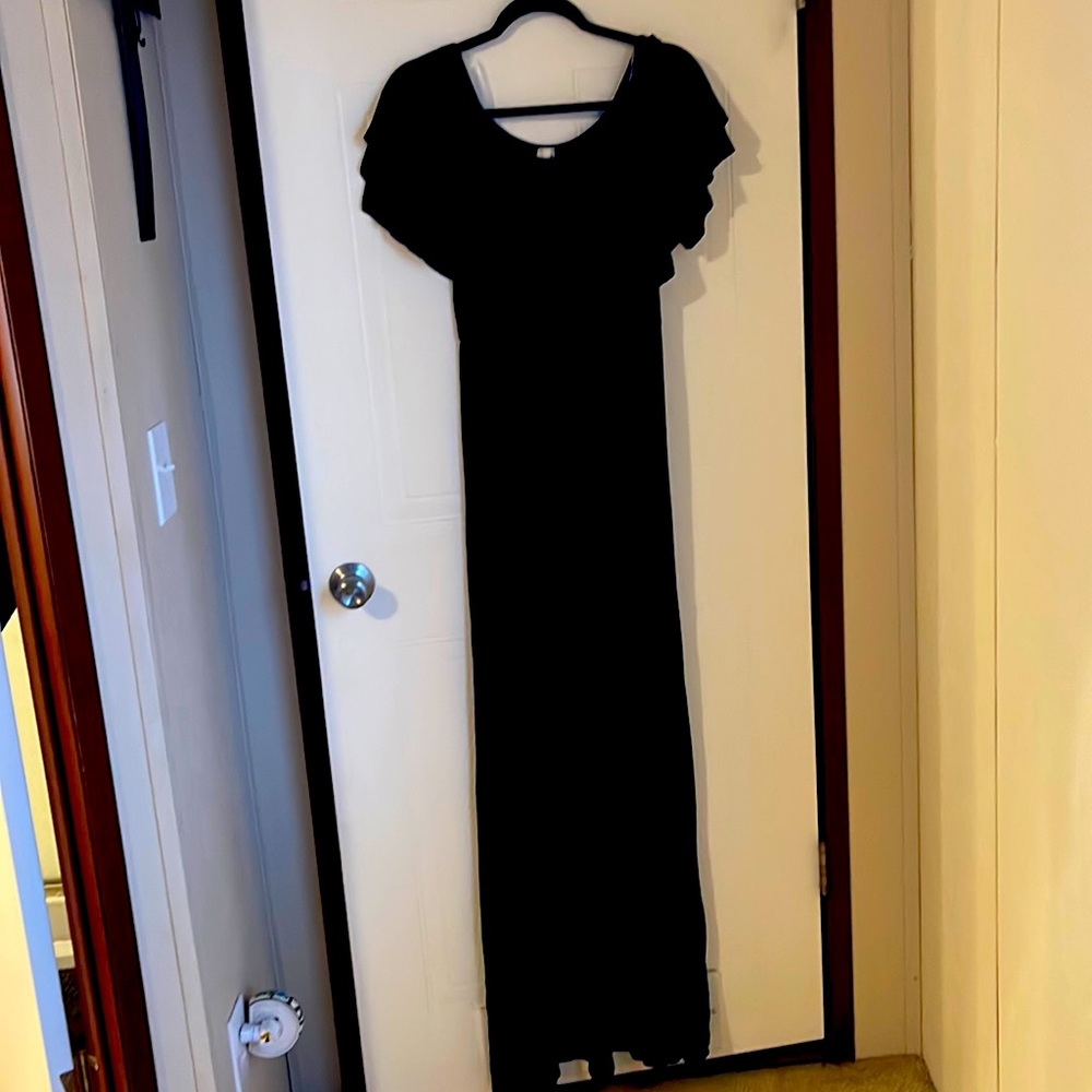 Solid black boutique dress, can be worn on or off the shoulders